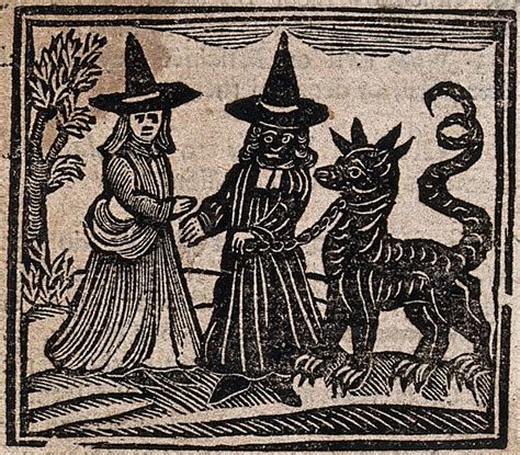 Witchcraft A White Faced Witch Meeting A Black Faced Witch With A
