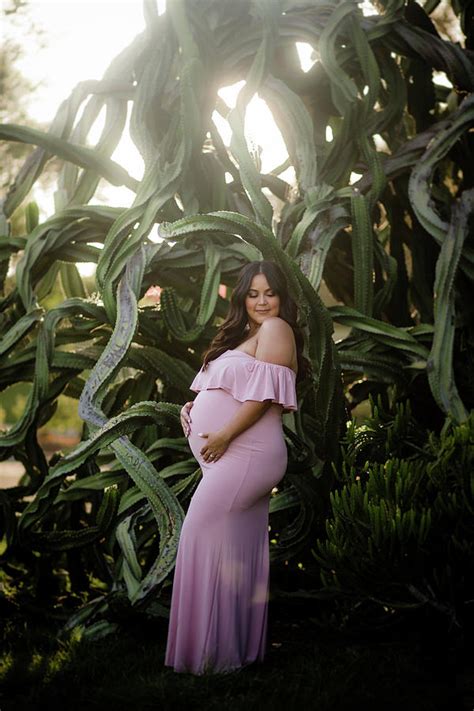 Pregnant Mom To Be Posing Next To Large Succulent Photograph By Cavan Images Fine Art America