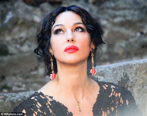 Monica Bellucci Flashes Her Cleavage As She Shoots New Dolce And Gabbana