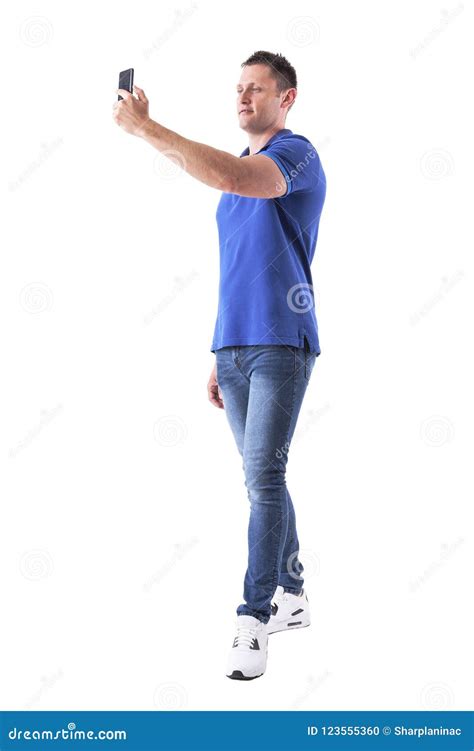 Adult Casual Man Holding Mobile Phone And Taking Self Portrait Photo