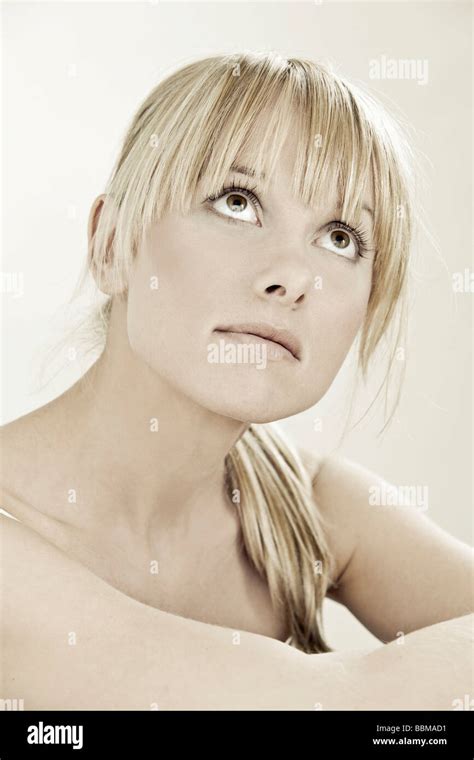 Pretty Young Woman Looking Up Stock Photo Alamy