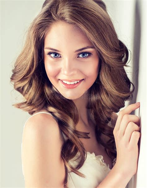Smiling Beautiful Girl Brown Hair With An Elegant Hairstyle Hair