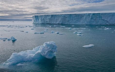 Icebergs With Austfonna Glacier On The Background Austfonna Ice Cap Nordaustlandet Island