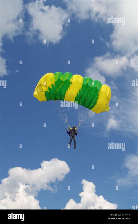 One Day With Parachutist In Airfield The Skydiver Lands Under The