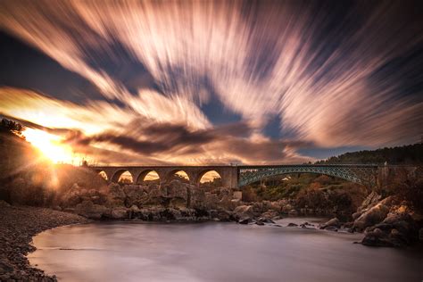Sunset Sunlight Bridge Rocks Stones River Timelapse Clouds