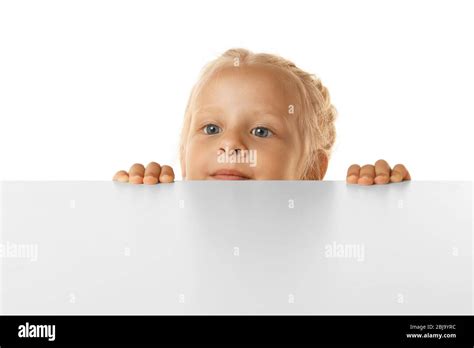 Funny Little Girl Hiding Behind White Table Stock Photo Alamy