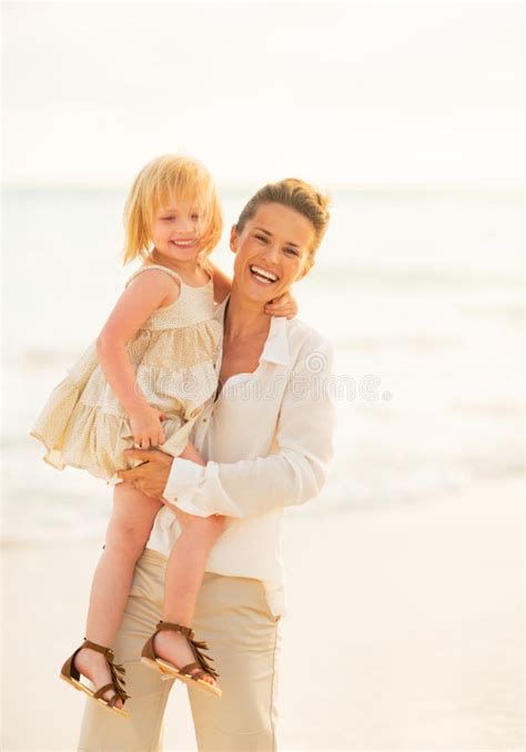 Mother And Daughter At The Beach Embracing Stock Image Image Of