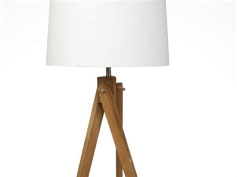 As task lighting, a statement piece or an accent, use table lamps to add color and design to a room. Wooden Tripod Floor Lamp with Cream Shade - Floor lamps ...