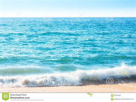 Seafoam On The Coast With Water Surface On The Background Stock Image