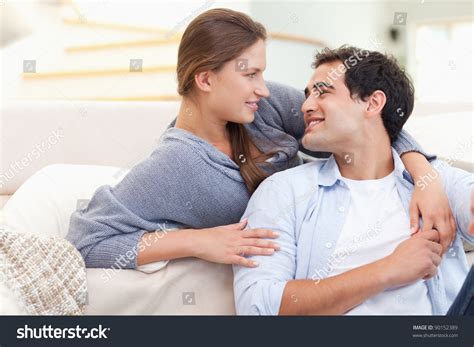 In Love Couple Hugging In Their Living Room Stock Photo 90152389