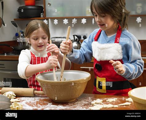 Kids Making Cookies Stock Photo Alamy