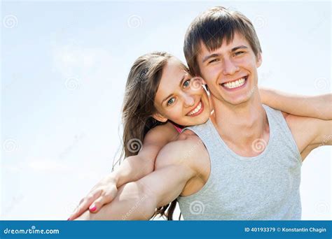 Young Woman Embracing Her Boyfrend Stock Image Image Of Couple