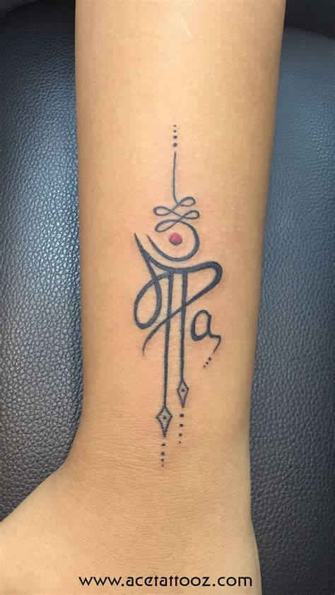 A Tattoo Dedicated To Parents With Maa And Paa Inked Together In A