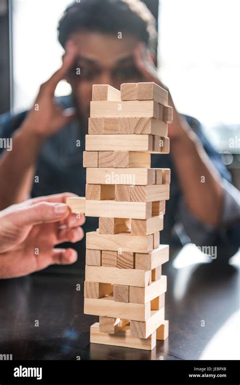 Friends Playing Jenga Hi Res Stock Photography And Images Alamy