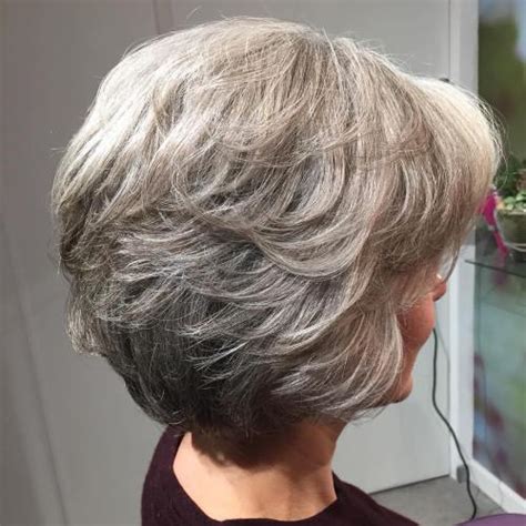 Gray hair looks stunning in this sleek graduated bob complimented with a side parting and long bangs that can be tucked for a more playful feel. 90 Classy and Simple Short Hairstyles for Women over 50