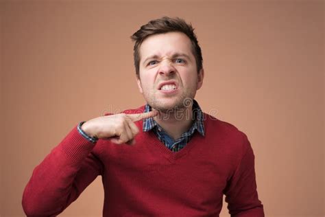 Man Gesturing With Index Finger At His Neck Stock Image Image Of