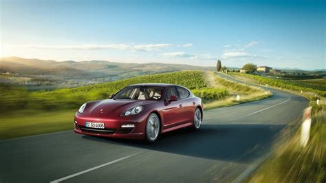 Red Porsche Car On The Road Driving Speed Hd Wallpaper