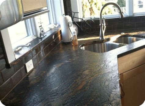 Do you want a glossy, reflective surface to brighten up your kitchen? I love this kitchen by Great Lakes Granite & Marble ...