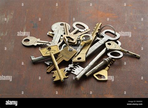 Group Of Vintage Keys On Old Wooden Table Stock Photo Alamy