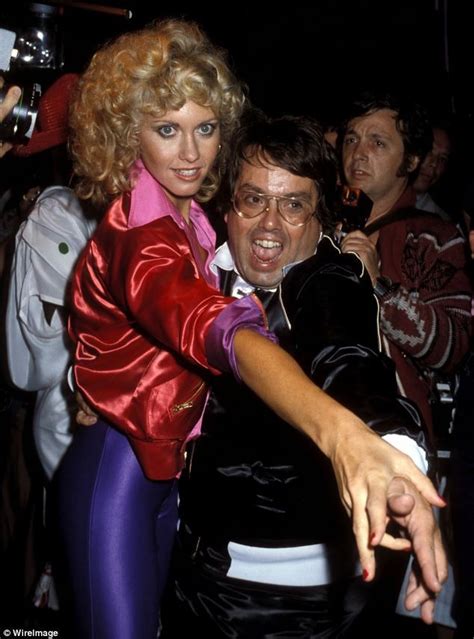 Singer Olivia Newton John And Producer Allan Carr Attend The Grease