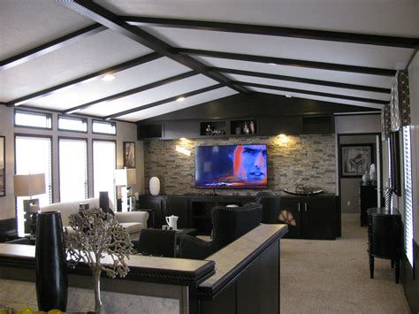 Living rooms should be as functional as they are beautiful. 18X80 Schultz Home. Fishbone Ceiling with Rock Entertainment Center. | Mobile home makeovers ...
