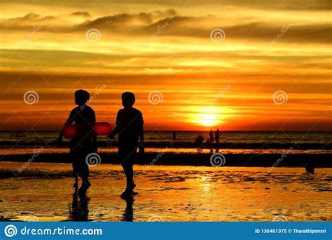 Sunset At The Beautiful Beach View Among The Many People Stock Image