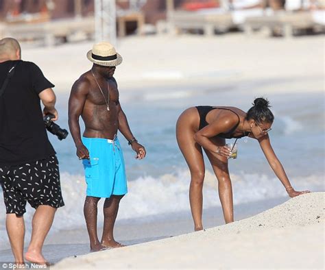 Kevin Hart Puffs On A Cigar On Romantic Beach Walk With Eniko Parrish