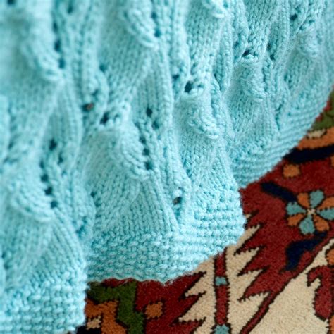 Free baby blanket or lap afghan knitting pattern. Free Knitting Pattern for a Leafy Lace Green Afghan