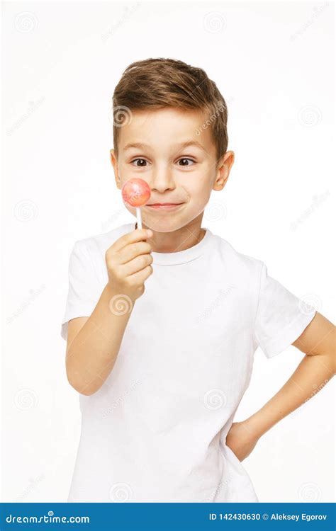 Little Boy With A Lollipop On A White Background Stock Photo Image Of
