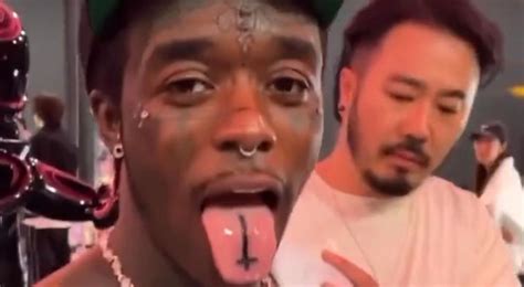 Lil Uzi Vert Get Upside Down Cross Tattoo On Tongue