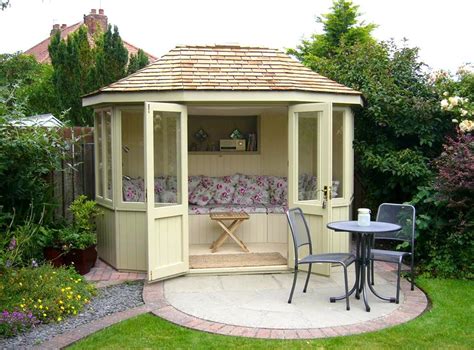 Oval Shaped Sun Ray Summerhouse Painted With Seatingupholstery From