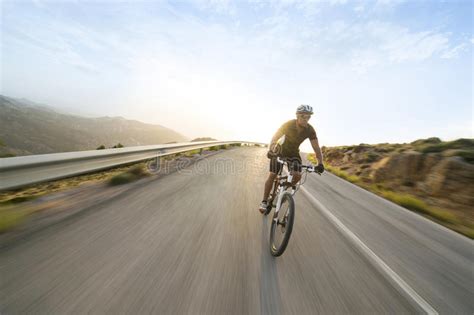 Cyclist Riding A Bike Uphill Stock Image Image Of Racer Movement