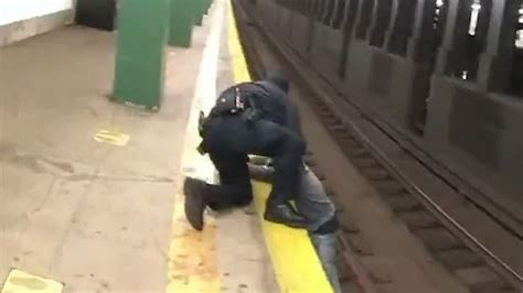Dramatic Moment Hero Nyc Cops Rescue Man Who Fell Onto Subway Track A Month After They Saved