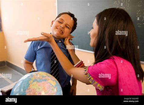 Teacher Punishing A Student Stock Photo Alamy