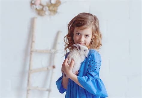 Cute Little Girl With A Bunny Rabbit Has Easter Stock Image Image Of