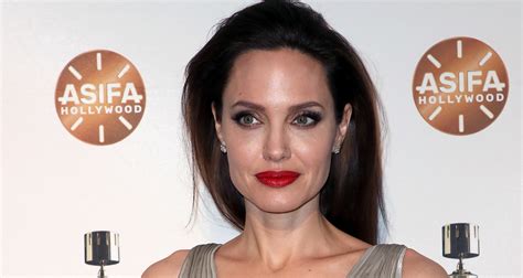Angelina Jolie Stuns In Silver On The Red Carpet Who Magazine