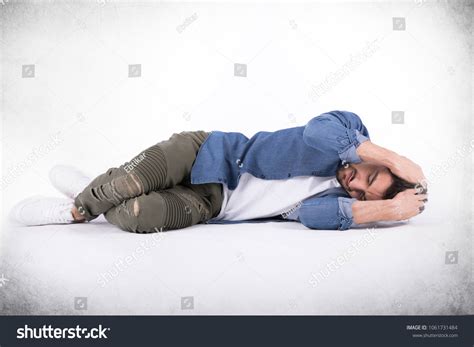 Depressed Young Man Lying On Floor Stock Photo 1061731484 Shutterstock