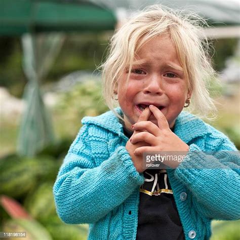 Poor Child Crying Photos And Premium High Res Pictures Getty Images