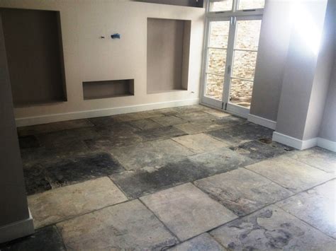 Stone offers a high end look, but should be sealed. Restoration of an Extremely Dirty Yorkstone Tiled Floor in Brighton | East Sussex Tile Doctor