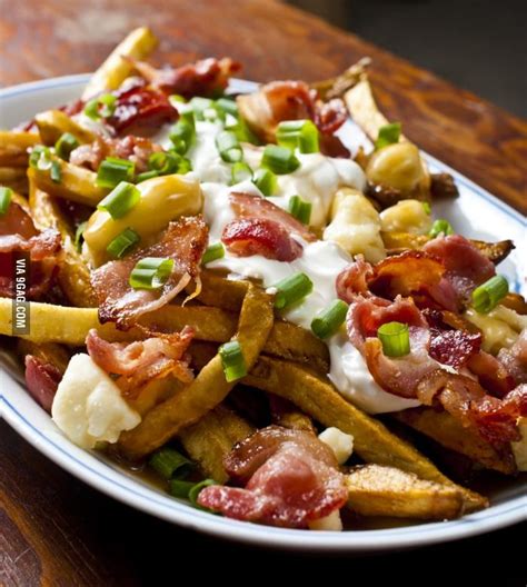 The Works Poutine Poutine With Sour Cream Bacon And Green Onions