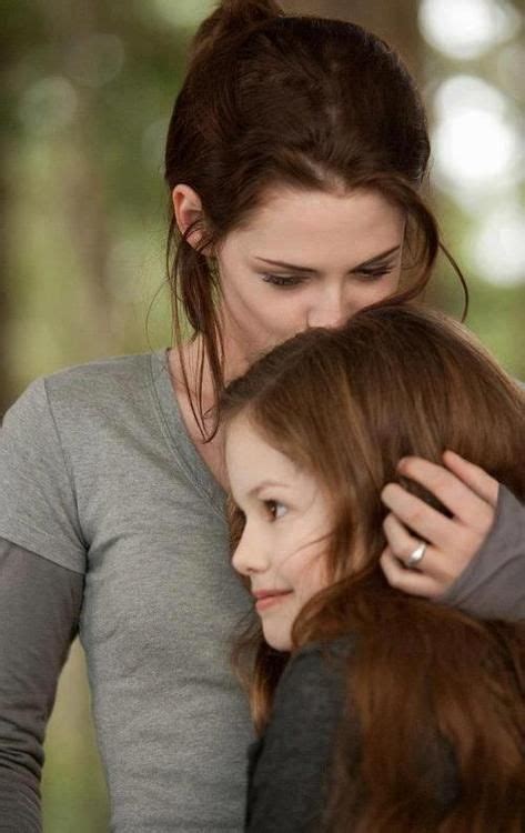 Kristen Stewart As Bella Swan Cullen And Mackenzie Foy As Renesmee Cullen The Twilight Saga