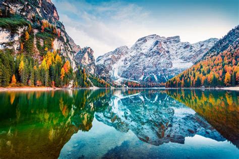 First Snow On Braies Lake Colorful Autumn Landscape In Italian Alps