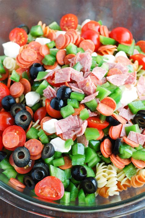 Spaghetti salad is our new thing for summer picnics. Easy Italian Pasta Salad with Pepperoni - Food Lovin Family