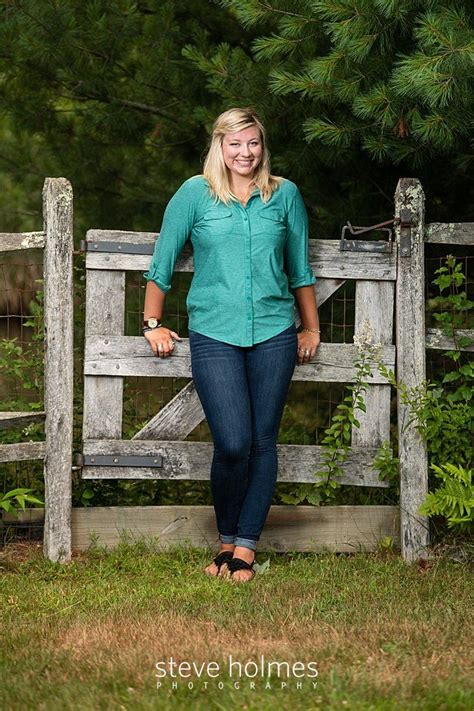 Blonde Teen Leans Against Wooden Gate For Outdoor Senior Photo Photo By Steve Holmes