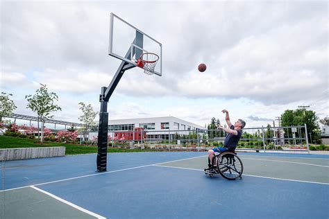 Active Disabled Athlete Practicing Wheelchair Basketball By Stocksy