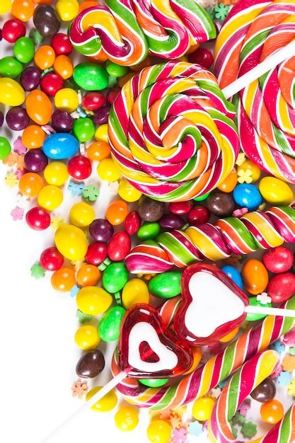 Premium Photo Colorful Candies And Lollipops