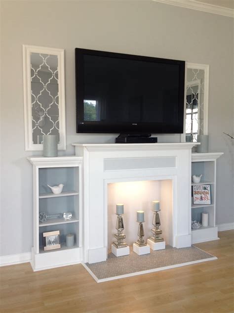 Just the addition of a faux mantel—no flame required—can make a space cozier. Pin on Tv Room