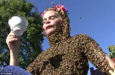 Woman Dances With Bees Buzzing All Over Her Skin
