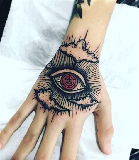 Tsukuyomi Infinite Hand Tattoos For Guys Hand Tattoos Badass Tattoos