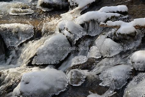 Iced Water Between Stones — Stock Photo © Photofrankyat 22885744